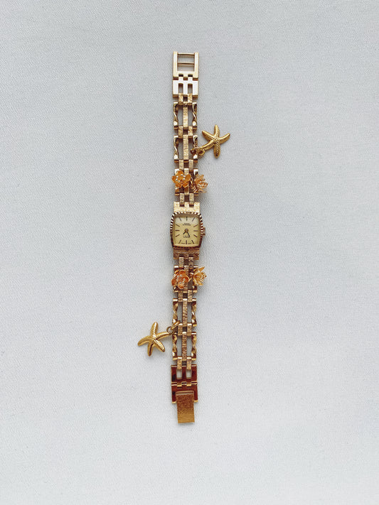 Gold Floral Watch with Star Details