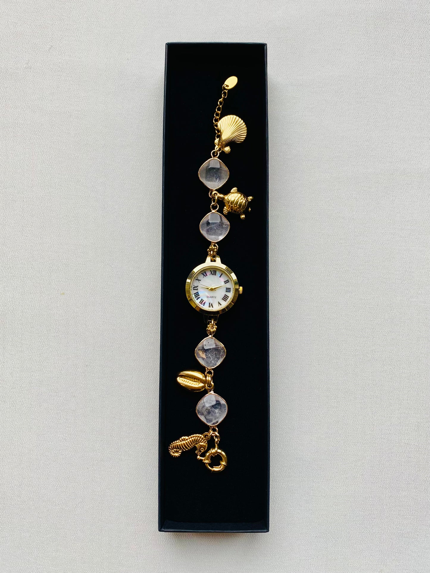 Gold Charm Watch with Clear Quartz