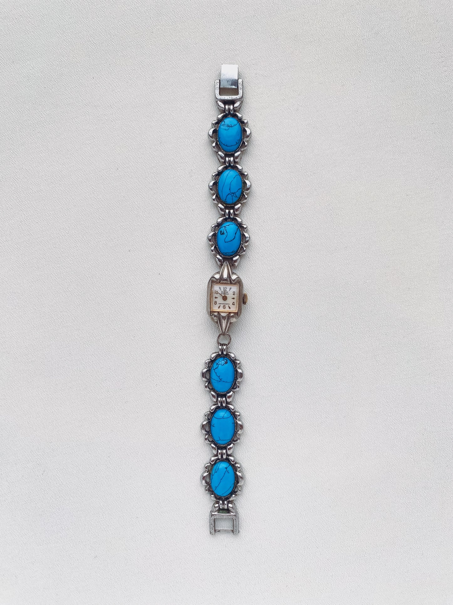 Turquoise Watch with a Square Dial